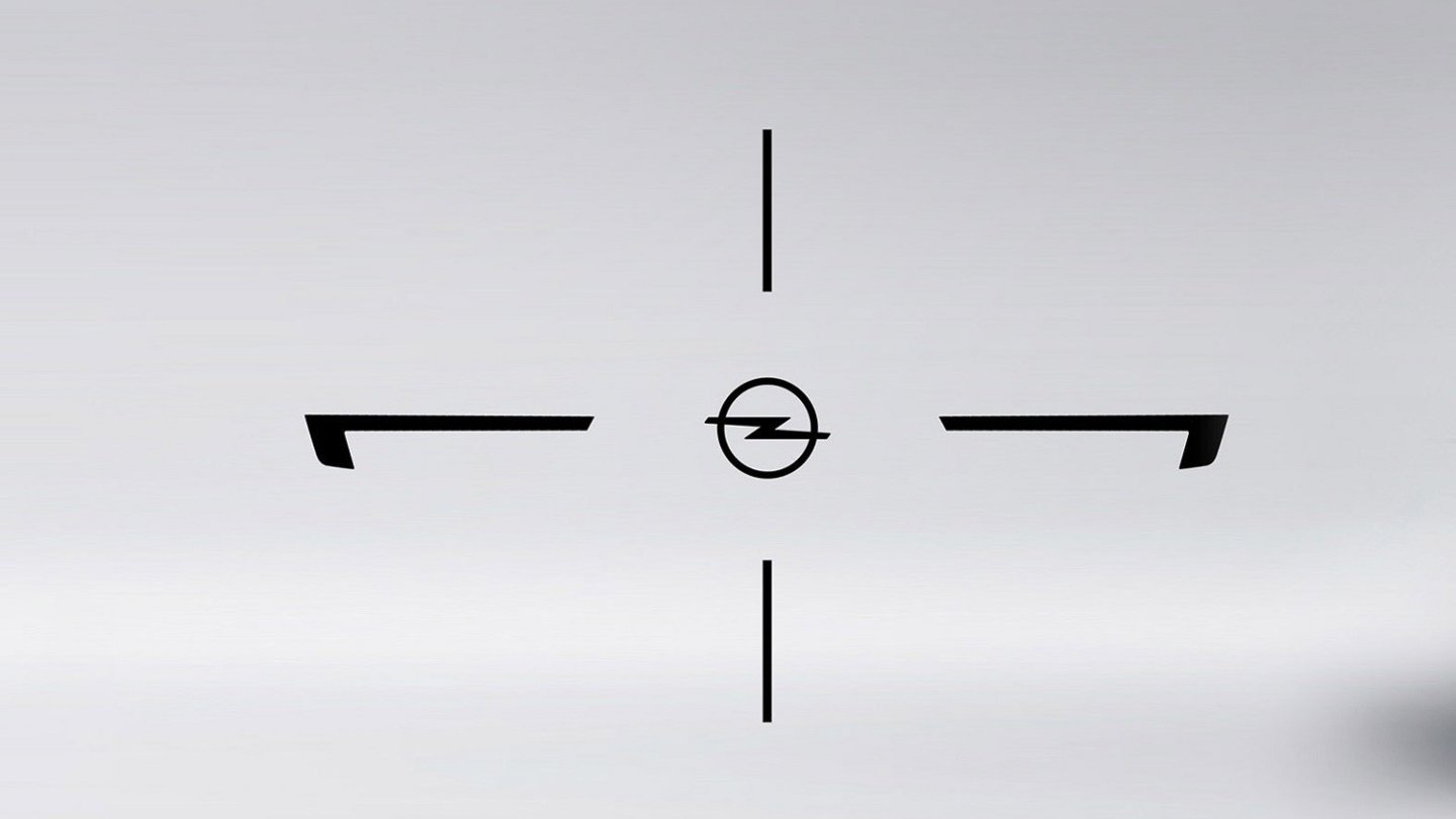 Der Opel-Blitz im Zentrum von zwei Achsen.